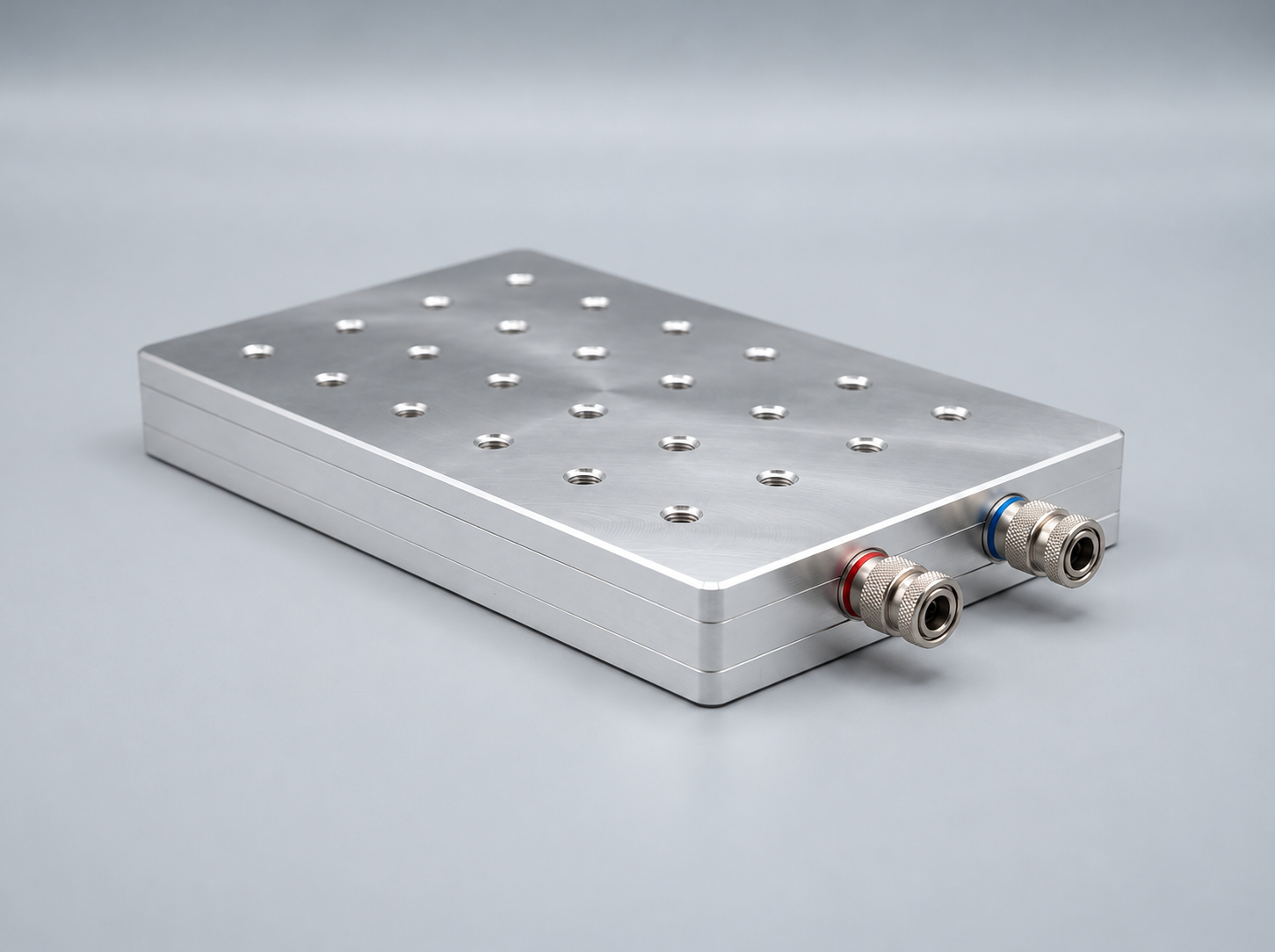 Precision CNC machined aluminum liquid cold plate with fluid ports and mounting holes