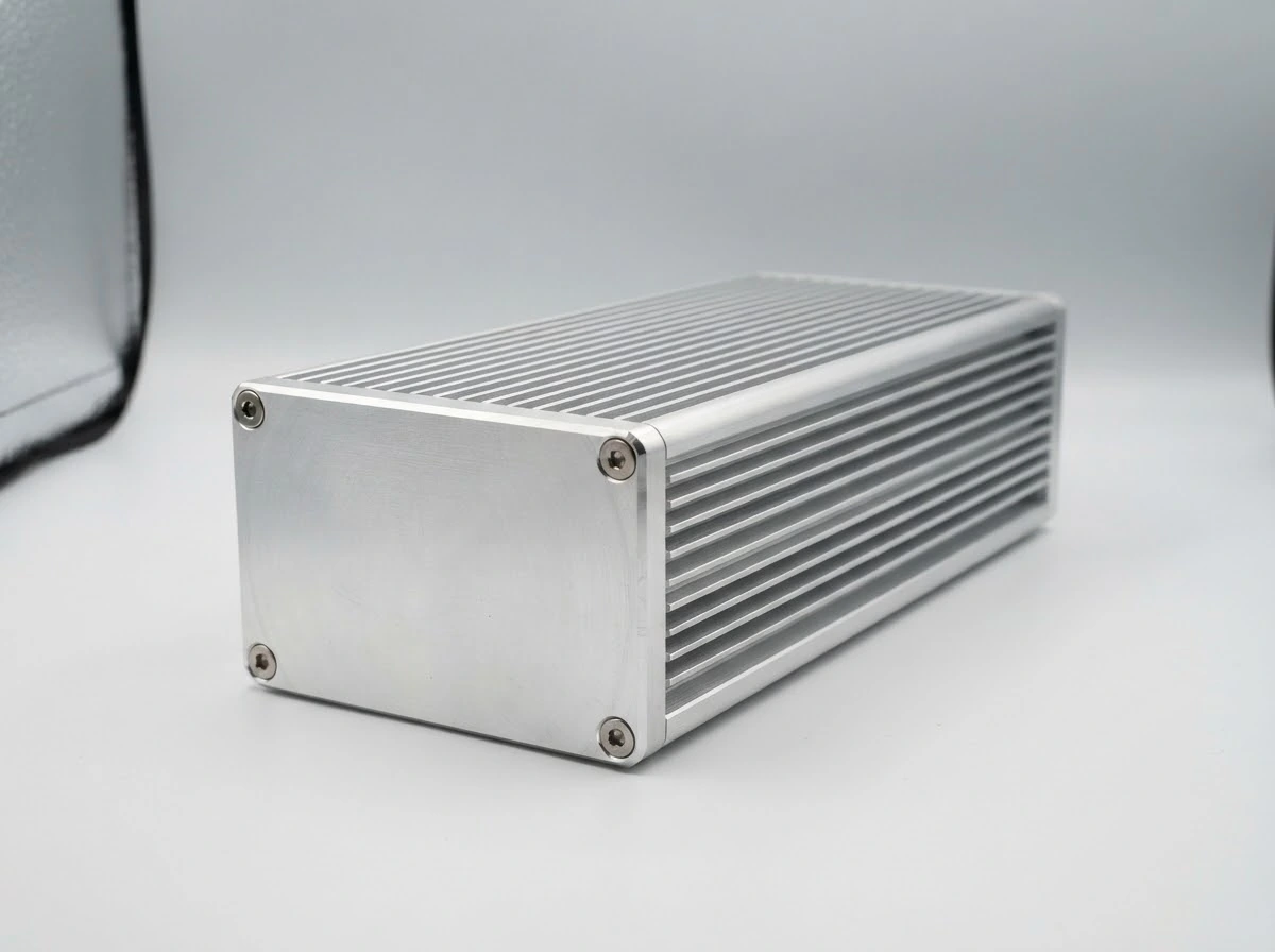 Natural silver anodized aluminum heat sink enclosure with longitudinal cooling fins