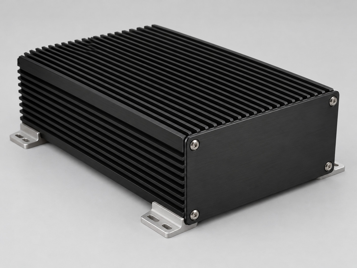 Bare black anodized finned aluminum thermal enclosure with a blank endplate and mounting feet.