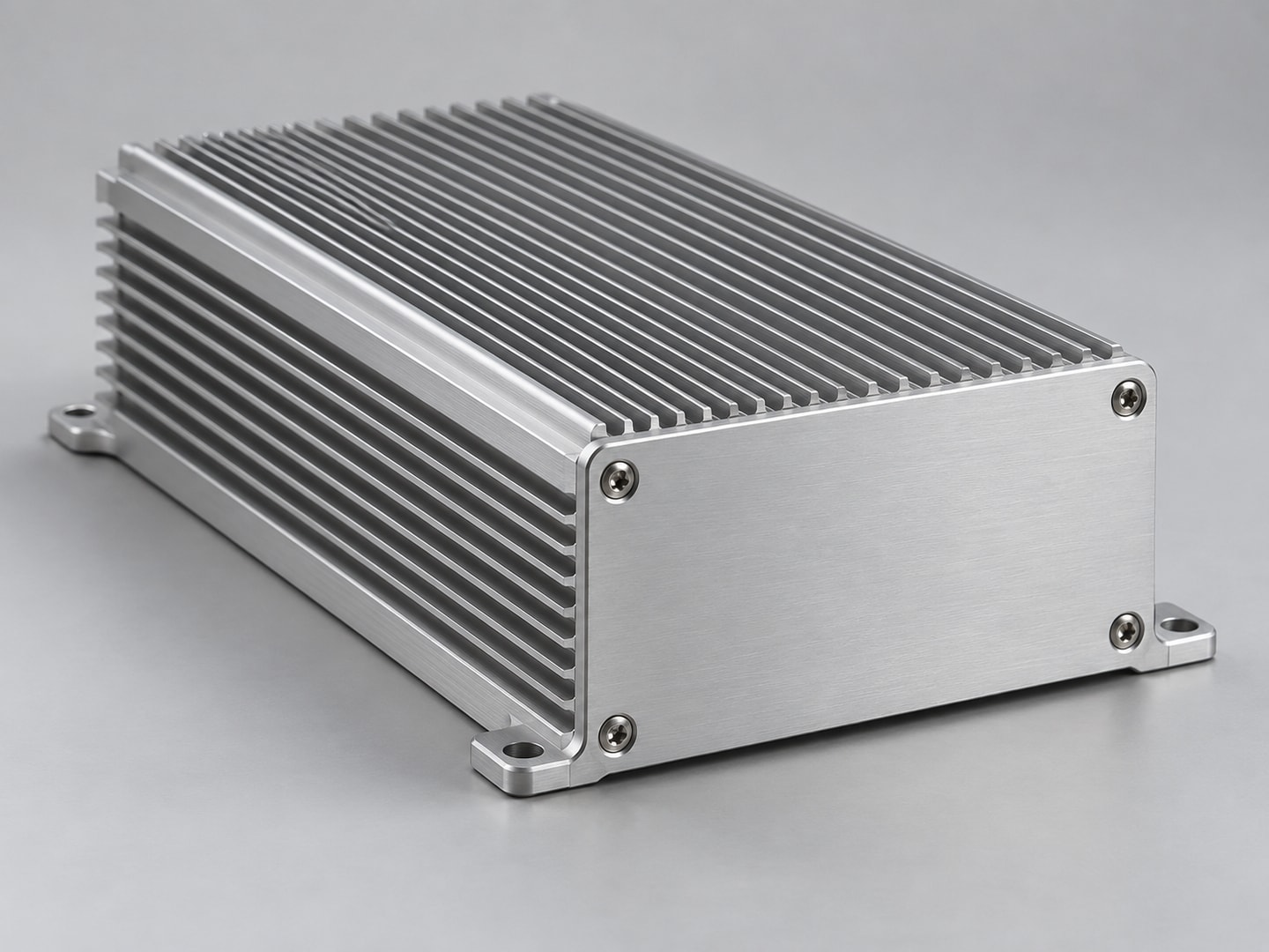 Silver extruded aluminum fanless enclosure with straight fins and removable endplate