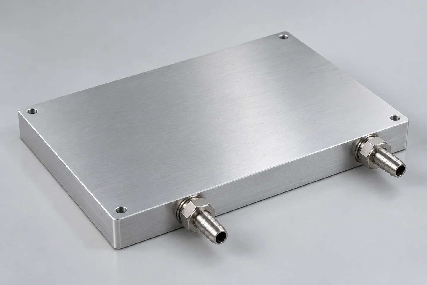 Closed aluminum liquid cold plate with two side coolant fittings