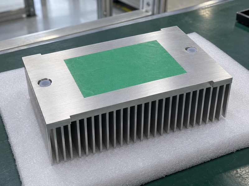 sandblasting aluminum heat sink masked thermal contact land and plugged mounting holes