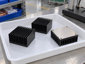 Surface treated aluminum heat sink samples with a masked underside contact pad