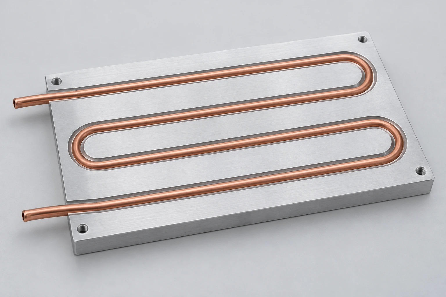 Continuous four-pass copper tube pressed into a machined aluminum cold plate